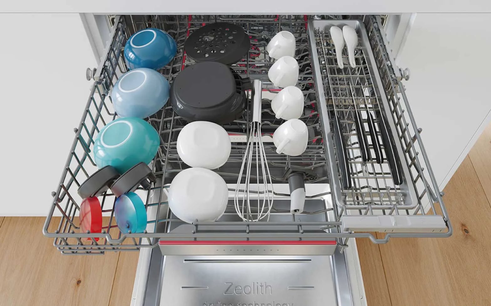 Intérieur de lave-vaisselle Bosch chargé de vaisselle, technologies cycle adaptatif AquaSensor
