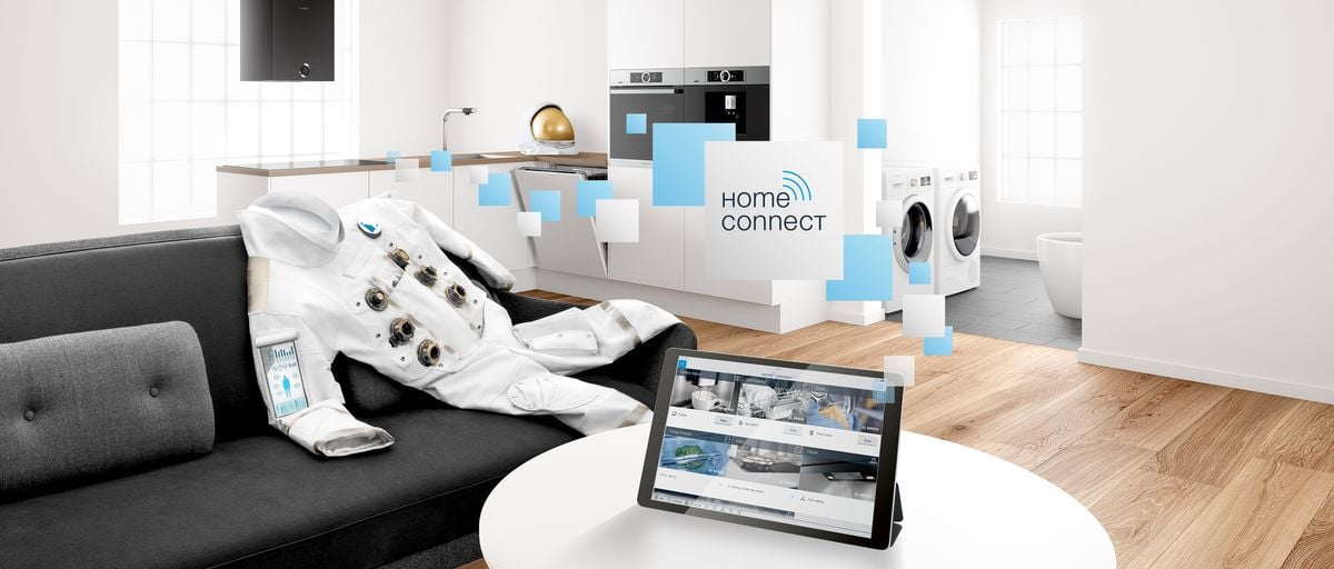 Écosystème Home Connect Bosch reliant four, lave-vaisselle et lave-linge via une tablette