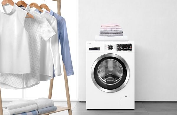 Lave-linge Bosch VarioDrum avec linge délicat suspendu et serviettes pliées