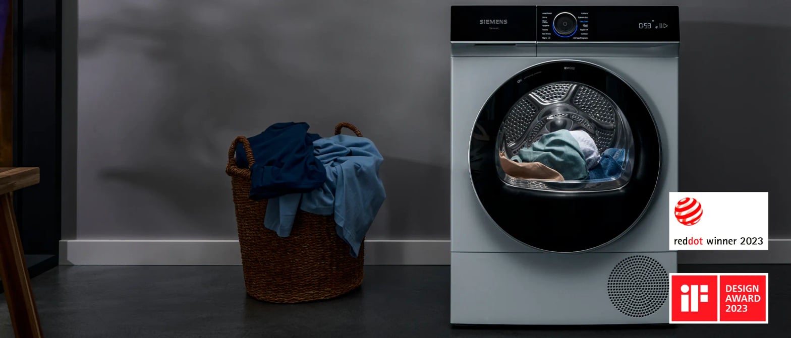 Sèche-linge Siemens iSensoric autoDry en buanderie avec écran de fin de cycle