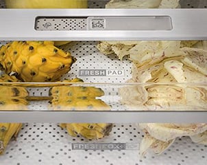 Tiroir FreshBox 0 et FreshPad Whirlpool avec fruits et légumes en gros plan